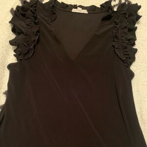 Black ruffle sleeve top
Size M